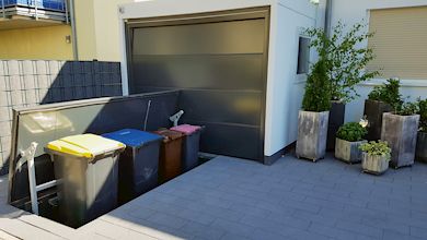 Mülltonnenlift, unteririscher Stellplatz, überfahrbarer Deckel, trafik up
